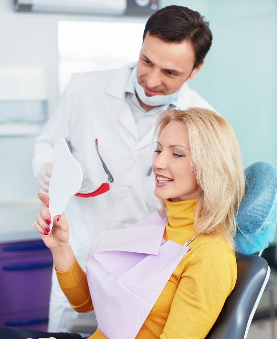 Photo of in-dental-clinic-lady-patient-and-doctor